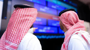 مخططات اقتصادية ترمز إلى أزمة السيولة العالمية وتأثيرها على الكويت والأسواق الخليجية